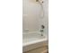 Tub and shower combination with classic white tiling at 129 Brent Cir, Oldsmar, FL 34677