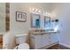 Spacious bathroom with dual vanity and granite counters at 129 Brent Cir, Oldsmar, FL 34677