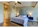 Comfortable bedroom boasts a cozy bed, modern decor, and ample natural light at 129 Brent Cir, Oldsmar, FL 34677