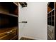 Walk-in closet provides ample storage with custom shelving at 129 Brent Cir, Oldsmar, FL 34677