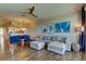 Stylish living room with modern décor, comfortable seating, and an open concept design to the kitchen at 129 Brent Cir, Oldsmar, FL 34677