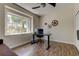 Well lit office with a window view and modern decor and furnishings at 129 Brent Cir, Oldsmar, FL 34677