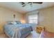 Guest bedroom with a dresser and a double bed at 402 Blue Marlin Dr, Oldsmar, FL 34677