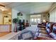 Open concept living room with views into the kitchen and another seating area at 402 Blue Marlin Dr, Oldsmar, FL 34677