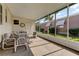 Spacious screened porch, perfect for enjoying the Florida sunshine at 402 Blue Marlin Dr, Oldsmar, FL 34677