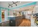Spacious kitchen with stainless steel appliances, granite countertops, and a large island at 6035 Sea Ranch Dr # 505, Hudson, FL 34667