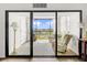 Relaxing balcony area featuring comfortable seating and scenic outdoor views at 830 S Gulfview Blvd # 305, Clearwater Beach, FL 33767
