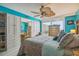 Main bedroom with large ceiling fan and ocean view at 6035 Sea Ranch Dr # 505, Hudson, FL 34667