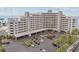 Multi-story waterfront building with parking and beautiful landscaping at 6035 Sea Ranch Dr # 505, Hudson, FL 34667