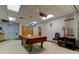 Relaxing billiards room, complete with a pool table and seating at 402 Blue Marlin Dr, Oldsmar, FL 34677