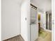 Stackable washer and dryer in laundry room at 830 S Gulfview Blvd # 305, Clearwater Beach, FL 33767