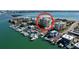 Aerial view of a waterfront building with a circular red highlight at 830 S Gulfview Blvd # 305, Clearwater Beach, FL 33767