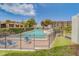 Refreshing community pool with lounge chairs and fenced-in area at 30 Turner St # 304, Clearwater, FL 33756