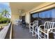 Private balcony with patio furniture and marina views at 1750 Harbor S Pl # 103, South Pasadena, FL 33707