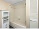 Clean bathroom with tub and shower at 1750 Harbor S Pl # 103, South Pasadena, FL 33707