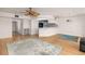 Bright living room with hardwood floors and a ceiling fan at 1750 Harbor S Pl # 103, South Pasadena, FL 33707