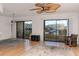 Spacious living area with water views and sliding glass doors at 1750 Harbor S Pl # 103, South Pasadena, FL 33707