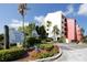 Lighthouse Harbor Marina Condominiums building entrance with landscaping at 1750 Harbor S Pl # 103, South Pasadena, FL 33707