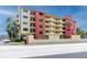 Building exterior showcasing architectural details and landscaping at 1750 Harbor S Pl # 103, South Pasadena, FL 33707