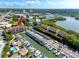 Aerial view of building, marina, and neighborhood at 1750 Harbor S Pl # 103, South Pasadena, FL 33707