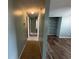 Hallway with carpeted floors and access to other rooms at 5060 86Th Ave N, Pinellas Park, FL 33782