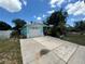 Single-story home with attached garage and a paved driveway at 5060 86Th Ave N, Pinellas Park, FL 33782