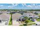 Aerial shot of neighborhood featuring lush landscaping and community features at 16701 Vibrato Ln, Land O Lakes, FL 34638