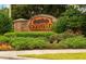 Oakstead community sign with brick base and lush landscaping at 19830 Ellendale Dr, Land O Lakes, FL 34638