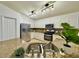 Modern kitchen with stainless steel appliances, granite countertops, and ample cabinet space at 19830 Ellendale Dr, Land O Lakes, FL 34638