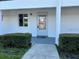 Condo building entrance with private walkway at 2060 Marilyn St # 124, Clearwater, FL 33765
