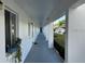 Clean and well-lit hallway with access to units at 2060 Marilyn St # 124, Clearwater, FL 33765