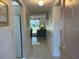 Hallway with view into living area and access to rooms at 2060 Marilyn St # 124, Clearwater, FL 33765