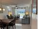Living room with sliding doors leading to patio and seating area at 2060 Marilyn St # 124, Clearwater, FL 33765