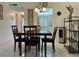 Bright dining room with table and chairs, near kitchen at 2060 Marilyn St # 124, Clearwater, FL 33765