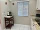 Kitchen with granite countertops and a coffee station at 2060 Marilyn St # 124, Clearwater, FL 33765