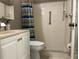 Walk in shower, toilet and vanity with updated fixtures at 2060 Marilyn St # 124, Clearwater, FL 33765
