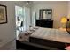 Main bedroom with a double bed and access to a balcony at 2060 Marilyn St # 124, Clearwater, FL 33765