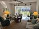 Living room with comfortable seating and patio access at 2060 Marilyn St # 124, Clearwater, FL 33765