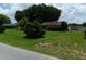 Single story home with large yard at 3754 Lake Joyce Dr, Land O Lakes, FL 34639