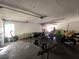 Garage with additional storage and vehicle space at 3754 Lake Joyce Dr, Land O Lakes, FL 34639