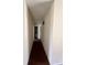 Hallway with doors to bedrooms and other rooms at 3754 Lake Joyce Dr, Land O Lakes, FL 34639