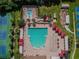 Community pool and surrounding amenities from above at 19830 Ellendale Dr, Land O Lakes, FL 34638