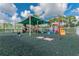 Community playground with shaded play equipment at 19830 Ellendale Dr, Land O Lakes, FL 34638