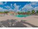 Resort-style community pool with lounge chairs and umbrellas at 19830 Ellendale Dr, Land O Lakes, FL 34638
