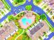 Aerial view showcasing a refreshing community pool area with lounge chairs, umbrellas, and lush greenery at 10254 Red Currant Ct, Riverview, FL 33578