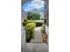 Inviting front entrance with lush landscaping and a clear walkway, plus a sunny view of the neighborhood at 10254 Red Currant Ct, Riverview, FL 33578