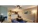 Comfortable living room with a ceiling fan and modern decor, creating a welcoming and stylish atmosphere at 10254 Red Currant Ct, Riverview, FL 33578