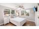 Bright bedroom with a double bed and hardwood floors at 1006 E Fern St, Tampa, FL 33604