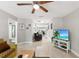 Bright living room with TV and comfortable seating at 1006 E Fern St, Tampa, FL 33604