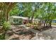Charming house with lush landscaping and patio at 1006 E Fern St, Tampa, FL 33604